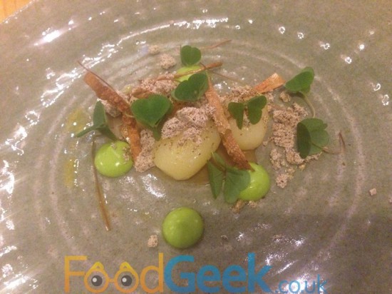 Heritage potatoes in onion ashes, lovage, shallot, wood sorrel